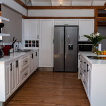 Aloha 08 -A fully equipped kitchen featuring state-of-the-art appliances.