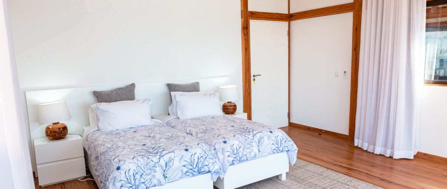 Suite bedrooms, each equipped with modern comforts for a restful night’s sleep.