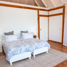 Suite bedrooms, each equipped with modern comforts for a restful night’s sleep.